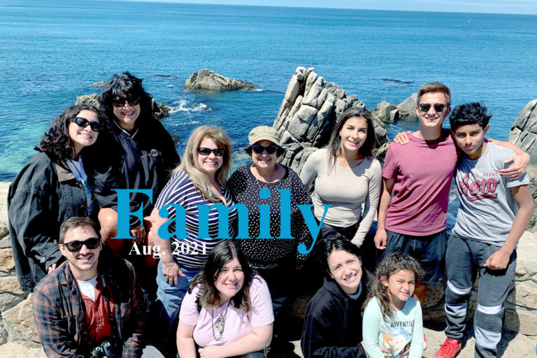 Group photo of some family members at the Beach in Monterey, CA.