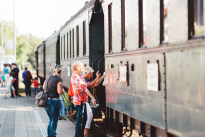 People boarding a train.